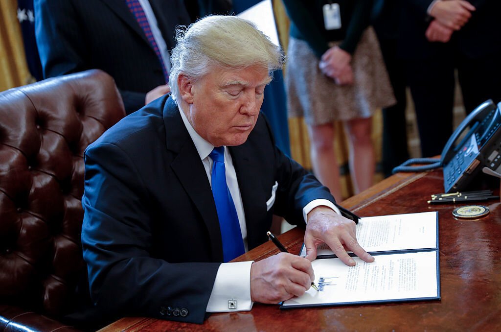 President Trump signed an executive order related to the oil pipeline industry in the Oval Office on January 24.