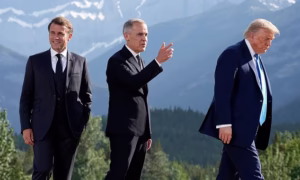 French President Emmanuel Macron, left to right, Prime Minister Mark Carney and U.S. President Donald Trump