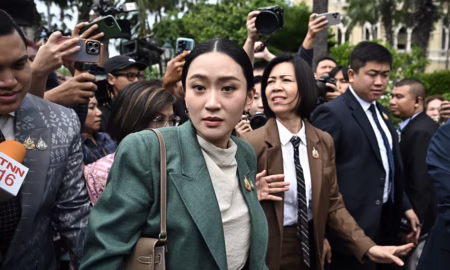 Thailand's Prime Minister Paetongtarn Shinawatra walks through Government House after a cabinet meeting in Bangkok on July 1, 2025.